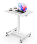 Go To Mobile Rolling Laptop Desk With Two Lockable Wheels Height Adjustable Sit Stand Computer Workstation From 28.54 To 42.52 Inches Pneumatic Lift Compact Ergonomic Home Office Desk 19 Inch White, with laptop and coffee mug on top.