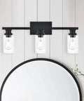 Three Light Vanity Bath Light Over Mirror In Deep Black With Clear Glass Cylinder Shades Industrial Farmhouse Wall Mount Fixture