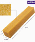 Abrasive cleaning eraser stick, yellow sponge-like block, 1.5 x 1.5 x 8 in, front view.