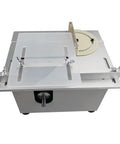Super Compact Mini Table Saw For Woodworking With Integrated Drill Press And Lathe Base Tough As Nails 12 To 24 Volt Power Tool top view showing adjustable platform.
