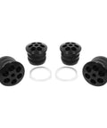 Beefy Aluminum Rear Cradle Bushing Kit For Hardcore Street Drift And Circuit Track Builds To Zero Out Body Roll Boost Chassis Stiffness And Stick Every Turn With Direct Bolt On Install For Easy Garage Swaps, featuring four black rigid bushings with holes.