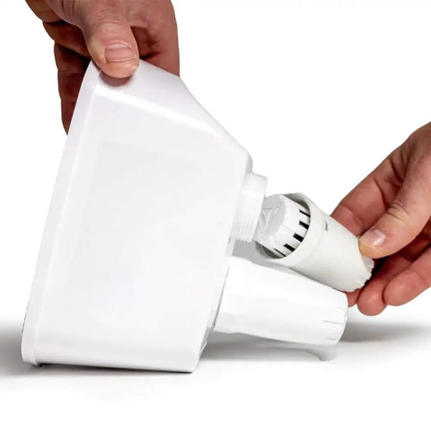 Person installing a filter into the water pitcher replacement filter pack for clean safe tap water with two genuine filters and Prime filter.