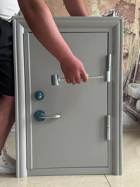 Person using Heavy Duty Door Hinge Gap Adjuster Tool With Double Head Pro Grade Steel Spanner For Easy Hinge Fixes Portable Heavy Duty Door Tool 8.5 To 17.5mm Small Gap Compatibility 2025 Upgrade on a small grey door.