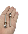 4 Pack RC Airplane Wheel Axles Steel Shafts With Nuts 4mm Diameter Landing Gear Drive Shafts on a Hand