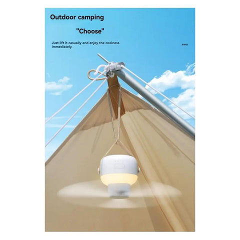 kousoer Ceiling Fans Quiet Remote USB 7200mAh hanging from a camping tent in a blue sky, providing cool air and light.