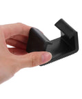 Close-up of Heavy Duty Outdoor Furniture Clips Set for Sofas and Patio Chairs, black plastic no slip secure bracket fastener.
