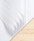 White Tissue Paper 14 By 20 Inches 130 Sheets Pack For Gift Bags And Party Decor Christmas Weddings Birthday Arts And Crafts DIY Wrapping Paper For Gifts on table