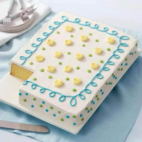 Decorated sheet cake on a platter made in an Extra Large 11 X 15 Inch Aluminum Baking Sheet Pan With 2 Inch Deep Sides For Even Heating