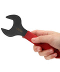 Person holding Castle Nut Wrench For ER20A Clamping Collet Chuck Spanner with red handle, heavy-duty cast steel.