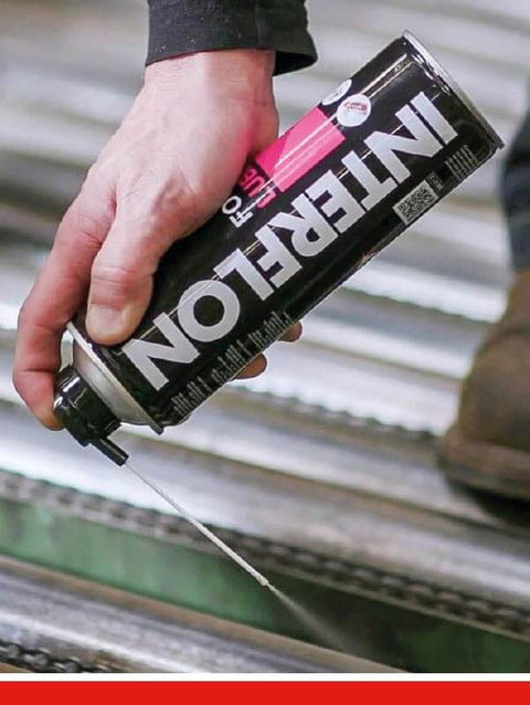 Hand using NSF H1 Food Grade Dry Film Lubricant For Food Processing Equipment Multipurpose Aerosol Can 500ml on machinery parts