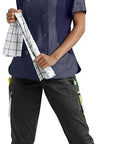 Slip Into These Black Chef Jogger Pants Five Pocket Stretch Kitchen Uniform Drawstring Elastic Waist Cotton Blend Restaurant Cook Workwear Built For The Kitchen Hustle on model with navy chef coat.
