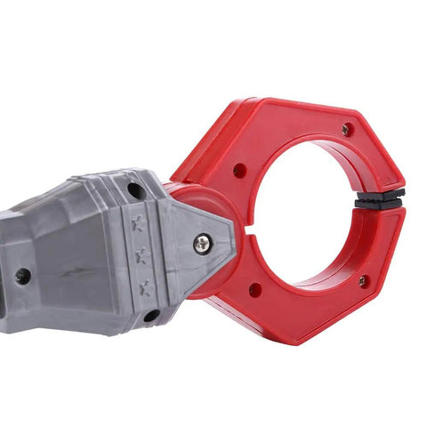 Close-up of Retro Robot Arm Grabber Toy For Kids With Pull And Release Grip And Rad Clacking Sound Plastic Robotic Pinch Tool