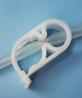 Adjustable Tube Clamps Set 0.236 To 0.472 Inch Diameter Tubing For Laboratory Flow Control Pinch Valve Hose Clamp in use, white POM