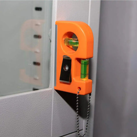 Spirit Level Tool Small Pocket Level with 2 Bubble Spirit Leveler Metal Keychain 3PCS attached to a wall showing vertical level.