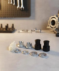 Must Have M12 EBike Hub Motor Axle Nut Kit With Front Lock Nut Lock Washer And Protective Cover For 12mm Shafts on workbench