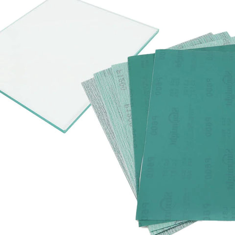 SCOTTCHEN glass sharpening plate with anti-slip mat and green abrasive sheets, front view