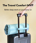 Compact Travel Memory Foam Neck Pillow For Deep Sleep On The Go Ideal For Hotels Camping And Side Or Back Sleepers Ultra Plush Portable Wellness Green strapped to suitcase