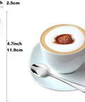 Demitasse Espresso Spoon Set Of 6, Mini Stainless Steel Coffee Spoons next to cappuccino, measures 4.7 inch, polished finish