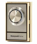 Rotary thermostat for home heating and cooling, beige casing, DIY friendly temperature controller.