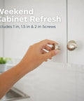 Hand using a brushed nickel round cabinet knob from Top Shelf 25 Pack 1 1 Inch Round Cabinet Knobs In Brushed Nickel Heavy Duty Kitchen Drawer Pulls That Are Pretty Darn Sturdy With Complete Mounting Kit For Fast Room Upgrades.