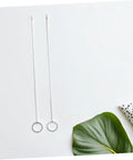 Two pieces from the Five Piece Long Sewing Needle Threader Kit With Stainless Steel Hook Latch Easy Threading on a white surface.