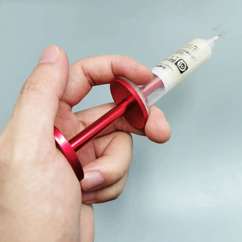 Hand holding Solder Paste Booster Kit For Mobile Phone PCB BGA Reballing And Pro Grade Soldering Flux Set with Red Push Rod