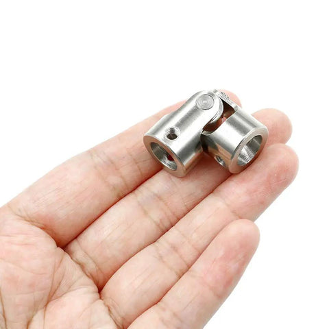 Heavy Duty 10mm Inner Bore Steering Shaft U Joint Universal Joint For RC Cars And Small Machinery, 16 x 34mm Outer Diameter And 34mm Length, 10mm Bore, Metal Coupling For Smooth Torque Transmission And Rock Solid Alignment. Nickel-coated iron RC shaft joint in hand
