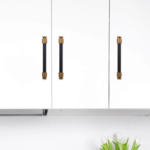 10 Pack 5 Inch Black And Antique Brass Kitchen Cabinet Handles Knurled Cabinet Pulls installed on white kitchen cabinets.