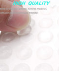 Close-up of hand peeling silicone pad from 202 Pieces Clear Adhesive Bumper Pads Set in Five Shapes with Self Adhesive Transparent Rubber Feet