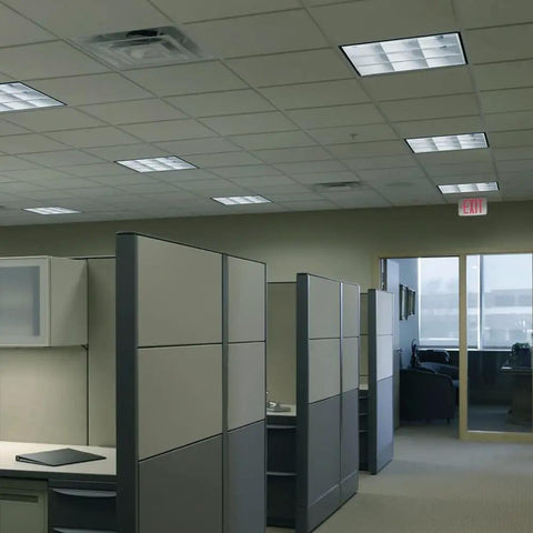 Office ceiling with EI500 M12 Contractor Select 500 Lumen Emergency Ballast for fluorescent fixtures, integrated in lighting system.