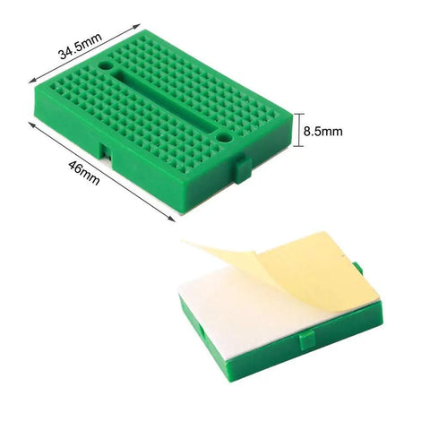 Green 170-point solderless breadboard from 48 Pcs Mini Breadboard Kit With 170 Point Solderless Prototyping Boards For Arduino Projects