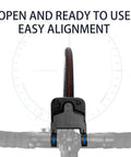 Badass Bicycle Laser Calibrator And Saddle Positioner Bike Tool with easy alignment on bike handlebars, showing tire and level indicator.