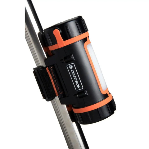 Go To Portable Power Tank LiFePO4 For Telescopes And Astronomy mounted on tripod leg, orange and black design, close-up