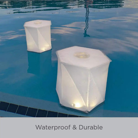 Bloomio Twist Solar Camping Lantern With Bluetooth App Control And Multicolor Led Lights floating on water