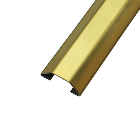Heavy Duty Stainless Steel Floor Cable Cover With Self Adhesive Backing Rock Solid Wire Taming Strip in gold finish.