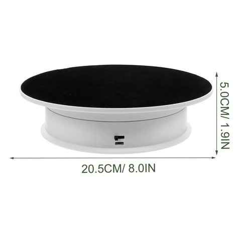 Spinning 360 Electric Turntable With Adjustable Dual Speeds For Jewelry Watch Showcase And Photography Shots Using Sleek Plastic Base, black top dimensioned 20.5cm.