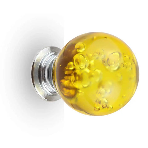 Pretty Dang Nice Crystal Cabinet Knobs Featuring Slick Glass Bubbles And Seriously Rock Solid Build Includes Handy Mounting Hardware For Easy Furniture Refreshes On Dressers Or Pantries 30Mm Yellow Tone showing a yellow glass bubble cabinet knob.