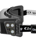 Side view of Auto Darkening Welding Goggles with Adjustable Sensitivity and Wide Shade 4/9-13, showing controls and head strap.