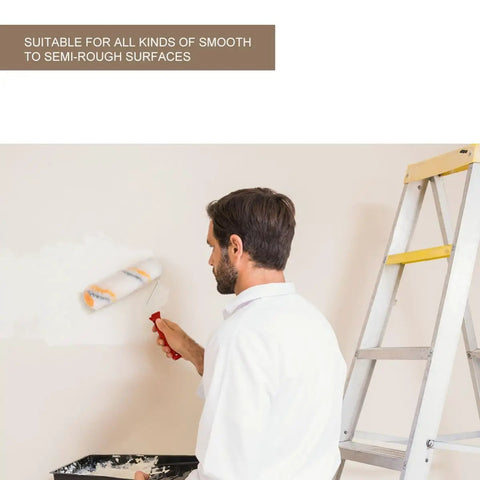 User painting a wall with a Hassle Free Mini Wall Paint Roller With Dense Wool Cover For Seamless Door And Baseboard Trim Projects Quick Setup Do It Yourself House Painting Supplies Delivers A Flawless Finish Every Single Time.