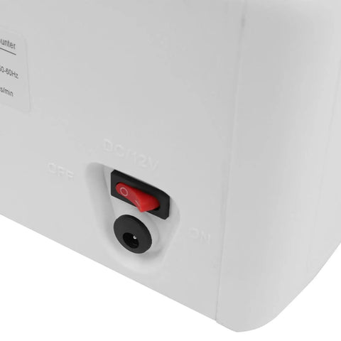 Close-up view of Portable Bill Counter With Counterfeit Detection And LED Display Ultrafast 800 Notes Per Minute power switch.