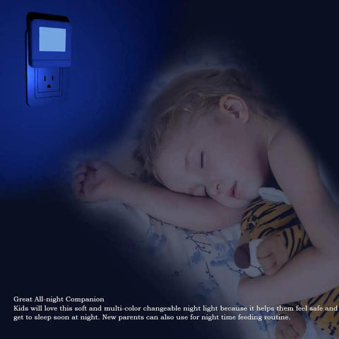 Plug In Led Night Light With Smart Dusk To Dawn Sensor Multi Color Changeable Night Lights illuminating a sleeping child