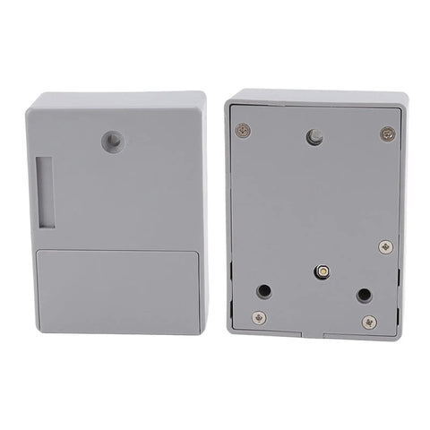 Kick Back And Relax Knowing This Heavy Duty Electronic Cabinet Lock Kit Keeps Your Drawers Locked Tight With Easy Peasy Keypad And Remote Access Plus Crisp Audio Chimes For Rock Solid Kid Safe Storage You Can Trust. Gray electronic cabinet lock kit viewed from front and back, showcasing its sleek design.