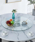 Premium Tempered Glass Lazy Susan Turntable Featuring A Sleek Swivel Design That Goes Hard For Family Dinners And Banquets on a round dining table with fruits.