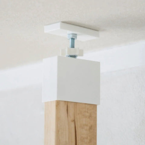 Close-up of Floor To Ceiling 2 X 4 Mounting Brackets For Heavy Duty Vertical Storage and DIY Wall Shelves, showing tension setup.