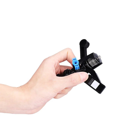 Hand holding a garden sprinkler head from 10 Pack Garden Sprinkler Heads With 360 Degree Rotating Lawn Watering System G1/2 Male Thread Durable Plastic