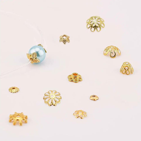 Golden Filigree Flower Bead Caps Set With 240 Pcs 12 Unique Brass Petal Ends shown with beads for jewelry making