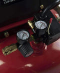 Close-up of pressure gauges and regulator on Rock Solid 20 Gallon Portable Air Compressor With Oil Free Twin V Cast Iron Pump.