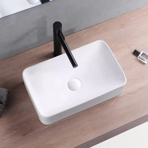 USZWBY Vessel Sinks Modern Minimalist Table Basin On The Counter Rectangular Washbasin Ceramic Art Bathroom Bowl Sink on wooden countertop.