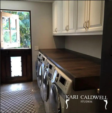 Top Shelf Mahogany Interior Wood Stain Featuring A Tannin Reactive Water Based Formula With Zero VOCs on laundry room cabinets.