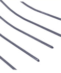Close-up of iron tines of a Handheld Manure Fork For Farming And Outdoor Work Durable Iron Pitch Fork For Grass Maintenance And Manure Handling A Real Go To Farm Tool For Farmland Garden And Yard Cleanup.